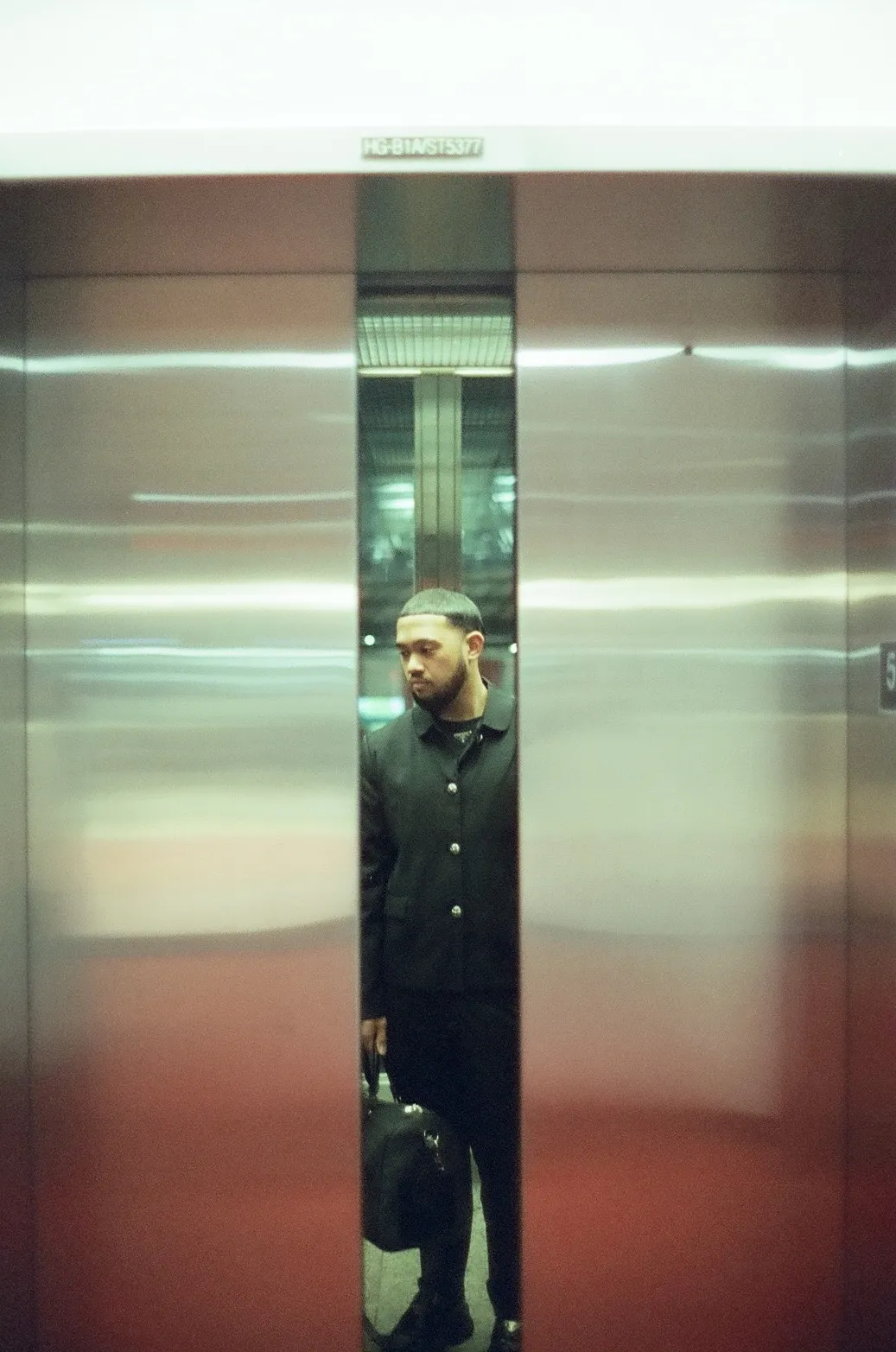 Film photograph from DMV, titled "justin3".